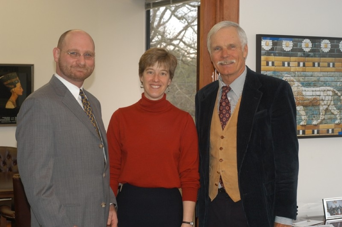 Ted Turner, right, with former clinic directors Larry Sanders and Julie Mayfield